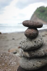 volcano rocks, cairn, beach